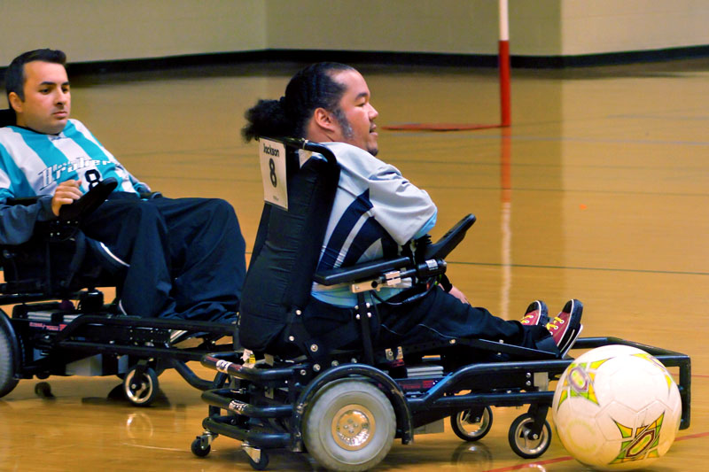 Tony playing power wheelchair soccer