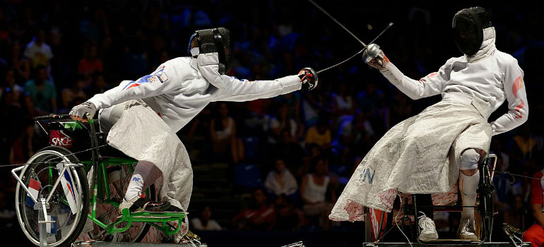 Wheelchair fencers competing